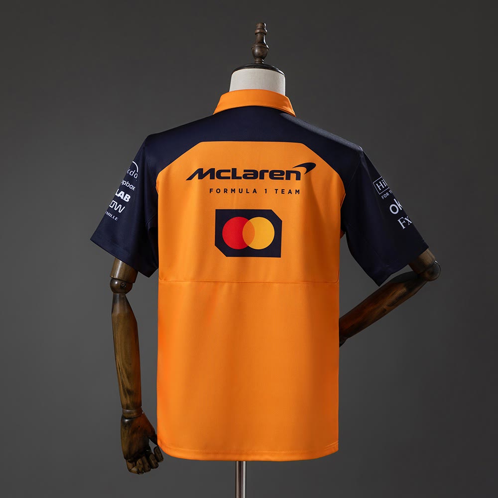 Polo McLaren Racing 2025 F1 Naranja y Azul Marino - Vista posterior