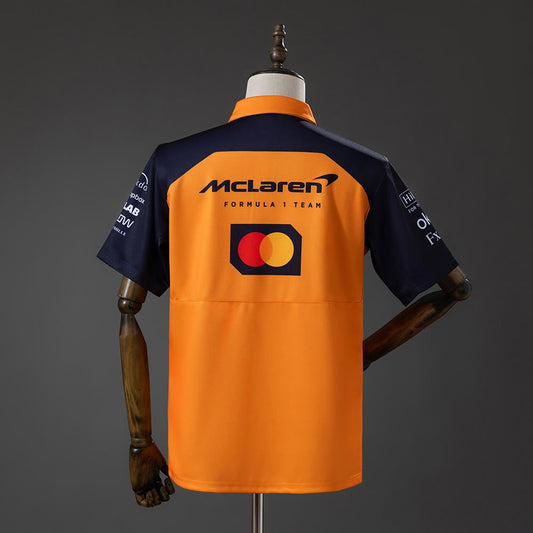 Polo McLaren Racing 2025 F1 Naranja y Azul Marino - Vista posterior
